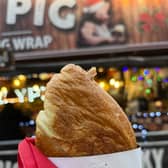 The famous Yorkshire pudding wrap from Porky Pig at Manchester Christmas Markets 2022. Credit: Manchester World