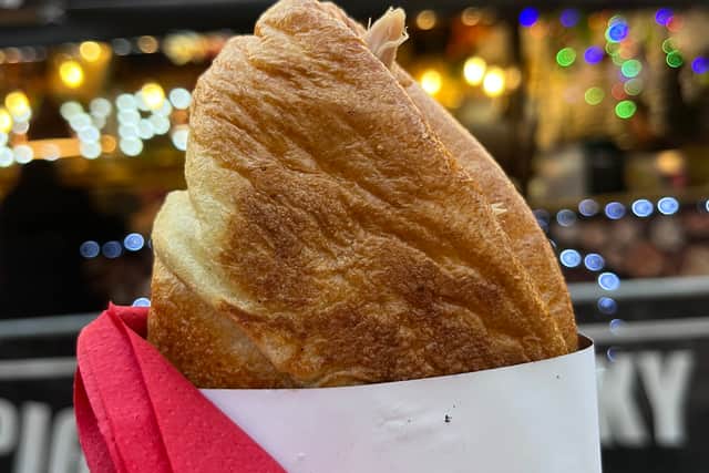 The famous Yorkshire pudding wrap from Porky Pig at Manchester Christmas Markets 2022. Credit: Manchester World