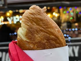 The famous Yorkshire pudding wrap from Porky Pig at Manchester Christmas Markets 2022. Credit: Manchester World
