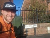 James Forrest at Bell End, on his rude place name charity hike Credit: James Forrest / SWNS