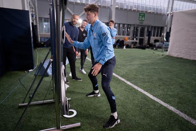 John Stones takes part in the reaction test Credit: Tom Maddick/ SWNS