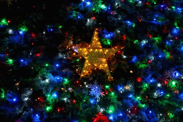 Christmas light switch-ons will be taking place in Ashton, Rochdale and Oldham this weekend. Credit: Chris Hyde/Getty Images)