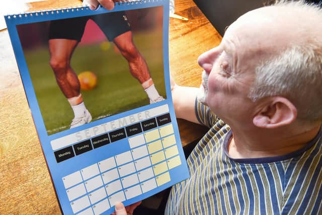 Kevin Beresford, from Redditch, with his Jack Grealish Calendar, ‘The Wonderful World of Jack Grealish’s Calves The Sequel 2023 Credit:  Emma Trimble / SWNS