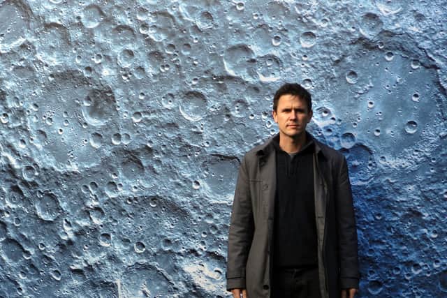 Artist Luke Jerram with his work Museum of the Moon