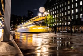 A Metrolink tram at night Credit: Christopher - stock.adobe.com