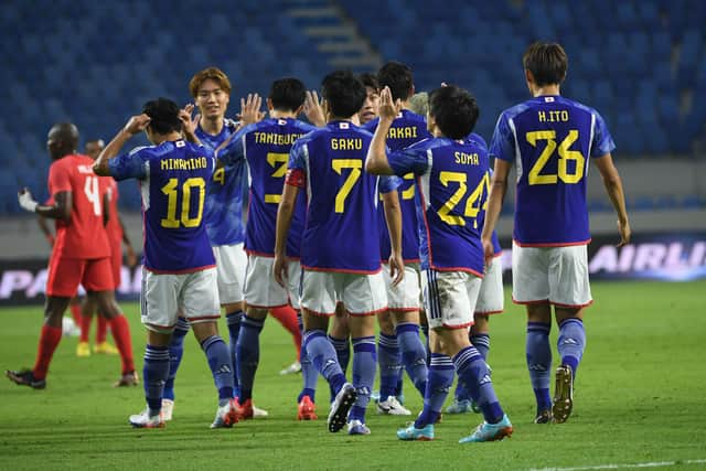 Soma Yuki of Japan celebrates scoring an opening goal with his teammates during the international friendly against Canada (Photo by Martin Dokoupil/Getty Images)