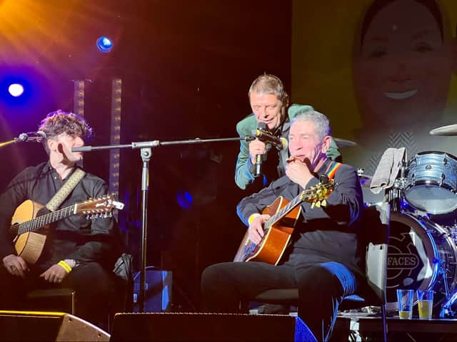 Mani on stage with renowned musician Michael Head (right). Photo: Paul Husband