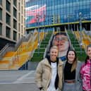 Helen Hardy (centre) with England women’s football team captain Leah Williamson and artist Charlotte Archer at Wembley. Photo: Getty Images/National Lottery