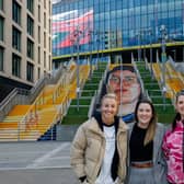 Helen Hardy (centre) with England women’s football team captain Leah Williamson and artist Charlotte Archer at Wembley. Photo: Getty Images/National Lottery