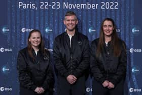 Meganne Christian (L), John McFall (C), and Rosemary Coogan (R) pose during a ceremony to unveil the European Space Agency new class of career astronauts in Paris on November 23, 2022