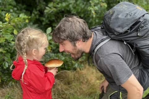   Jim Parums and his daugher foraging a mushroom Courtesy Jim Parums / SWNS