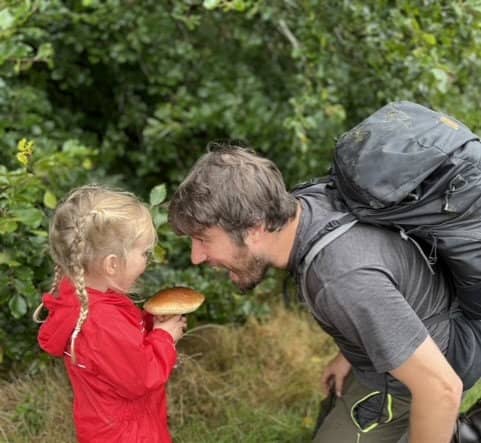   Jim Parums and his daugher foraging a mushroom Courtesy Jim Parums / SWNS