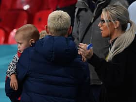 England's midfielder Phil Foden (L) and his partner Rebecca Cooke (R) are seen in the stands at the end of the UEFA EURO 2020 Group D football match between Czech Republic and England at Wembley Stadium in London on June 22, 2021. (Photo by JUSTIN TALLIS / POOL / AFP) (Photo by JUSTIN TALLIS/POOL/AFP via Getty Images)