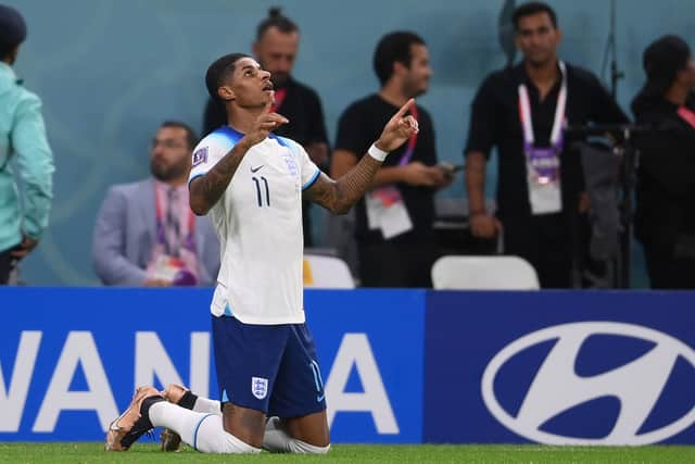 Marcus Rashford of England celebrates after scoring their team’s first goal during the FIFA World Cup Qatar 2022 Group B match between Wales and England. (Photo by Laurence Griffiths/Getty Images)