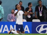 Marcus Rashford of England celebrates after scoring their team’s first goal during the FIFA World Cup Qatar 2022 Group B match between Wales and England. (Photo by Laurence Griffiths/Getty Images)