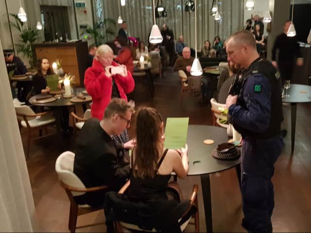 Police speaking to Animal Rebellion activists in Mana