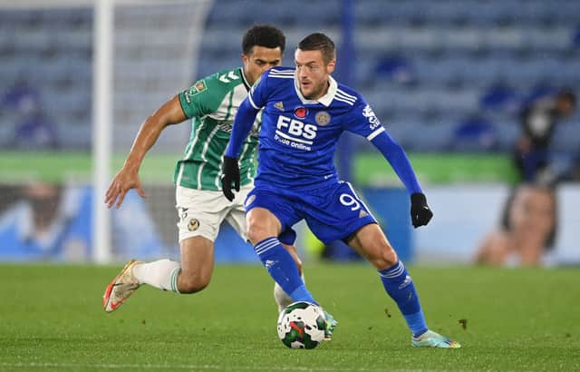 Jamie Vardy of Leicester City battles for possession with Priestley Farquharson of Newport County during the Carabao Cup Third Round match between Leicester City and Newport County at The King Power Stadium on November 08, 2022 in Leicester, England. (Photo by Michael Regan/Getty Images)