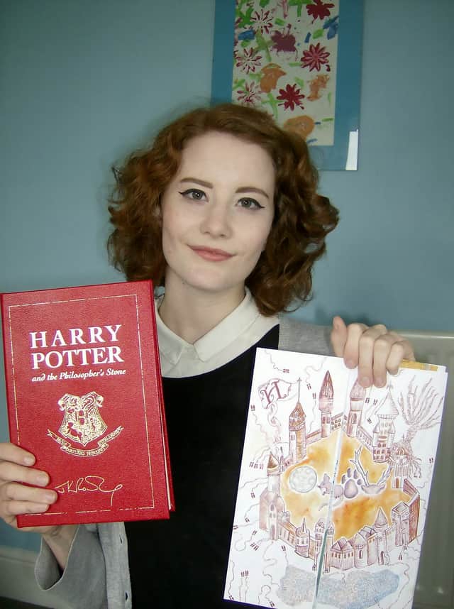 Chloe Esslemont aged 16 with her Harry Potter book prize and entry.  