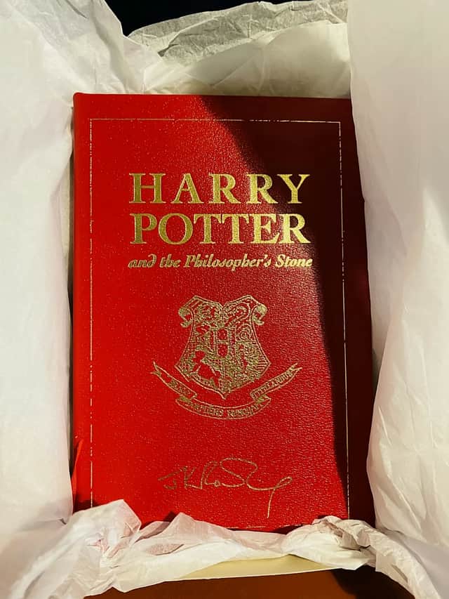 The leather-bound special 15th  anniversary edition of Harry Potter and the Philosophers Stone -  published exclusively for the competition in 2012.