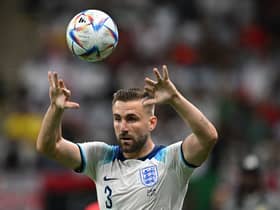  Luke Shaw puts the ball back in play from the touchline during the Qatar 2022 World Cup round of 16 football match between England and Senegal 