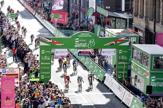 Mathieu van der Poel crossing the finish line of the Tour of Britain 2019, on Deansgate in Manchester. Credit: SWpix.com