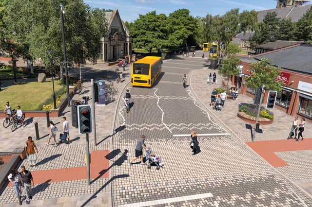 A view of how Heywood town centre could look with a rapid transit bus service and pedestrianised areas. Credit: Rochdale Development Agency