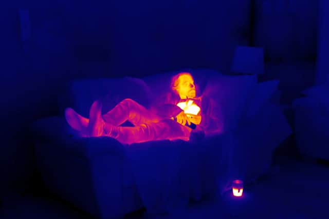 A photo taken with a thermal imaging camera showing someone living in a cold house. Photo: Grey Hutton