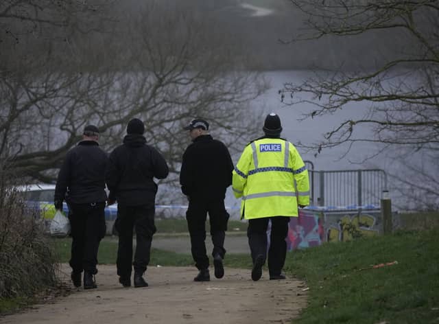 Police at the scene in Babbs Mill Park, Kingshurst. 