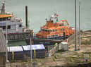 An RNLI life boat arrives back in port after taking part in a rescue mission in the English Channel.