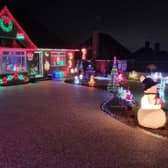 Julie and Mark Peacock from Derbyshire are raising money for Wythenshawe Transplant Centre with their stunning Christmas lights display. Credit: Julie Peacock