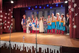 Ukrainian children in Ashton perform on stage during the St. Nicholas Day celebrations. Credit: Manchester World