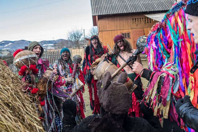 A Malanka celebration in full swing in the village of Krasnoilsk, Chernivtsi region, Ukraine. Credit: Brendan Hoffman/Getty Images