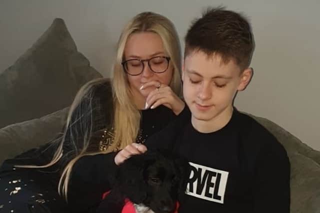 Rosie back with her family after her Christmas ordeal. Photo: Vets Now