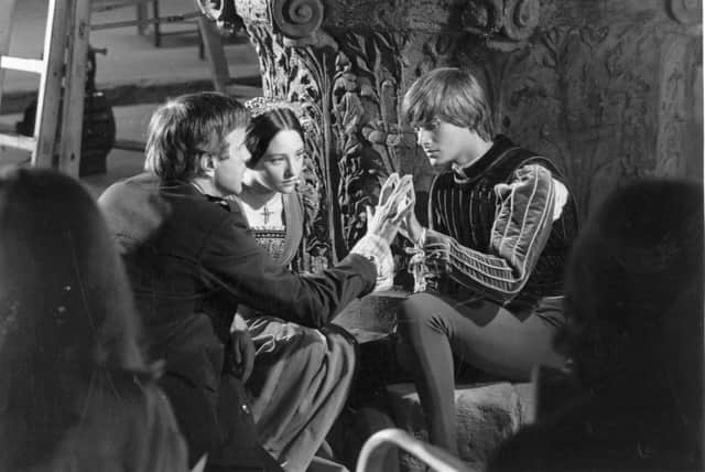 Italian stage and film director, Franco Zeffirelli with Olivia Hussey and Leonard Whiting, during the filming of 'Romeo and Juliet'. (Photo by Express/Express/Getty Images)