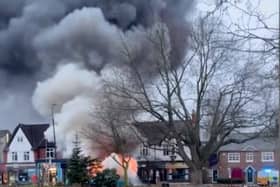 The bus fire in Hale Credit: via SWNS