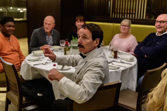 Manuel interacts with diners during the immersive  Fawlty Towers experience, coming to Manchester this February. Credit: Jane Hobson