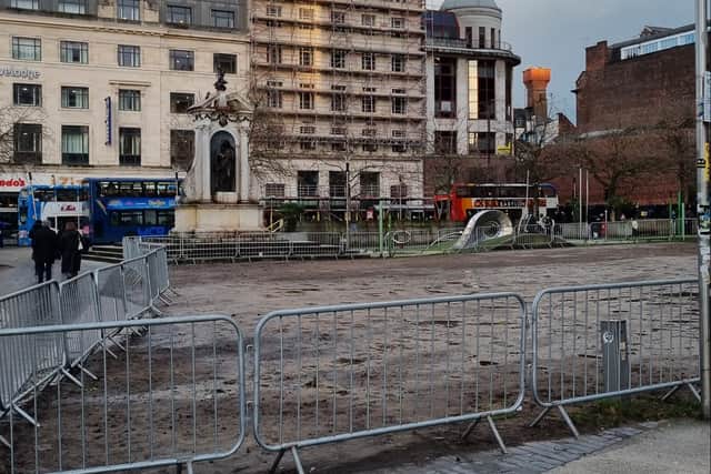 Parts of Piccadilly Gardens have been fenced off after turning into a mudbath. Photo: William Connolly