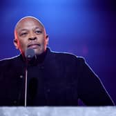  Dr. Dre introduces Inductee Eminem onstage during the 37th Annual Rock & Roll Hall of Fame Induction Ceremony at Microsoft Theater on November 05, 2022