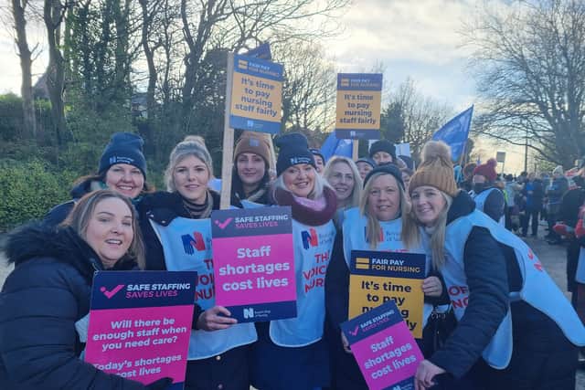 Nursing staff taking part in strike action outside Wigan Infirmary