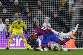 Wilfried Zaha praised Aaron Wan-Bissaka after Manchester United drew 1-1 with Crystal Palace. Credit: Getty.