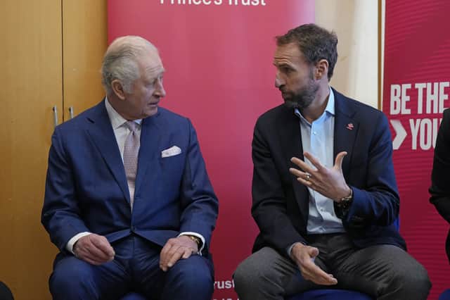 King Charles III (left) talks to Gareth Southgate, England football manager and Prince’s Trust ambassador during a visit to the Norbrook Community Centre in Wythenshawe, Credit: PA