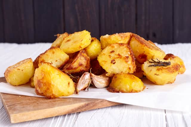 Perfect crispy roasted potatoes are a much-loved British delicacy available at Toby Carvery restaurants - Credit: Adobe