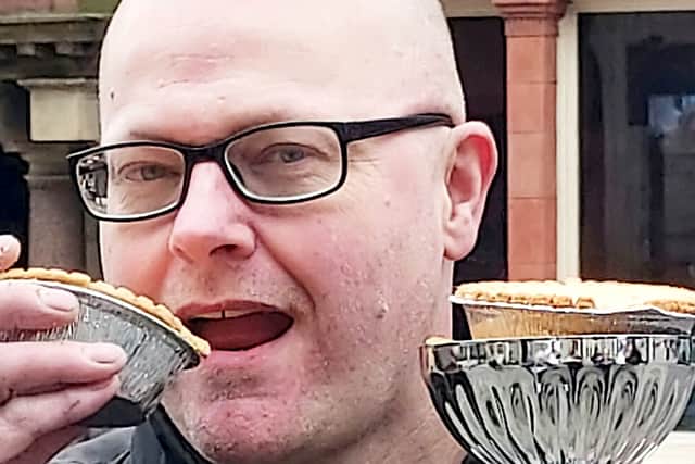 Hometown hero Barry Rigby gobbled up a hat-trick of victories in the World Pie Eating Championships Credit SWNS