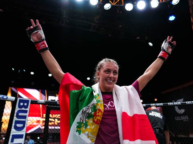 Dakota celebrating her victory with both the Bulgarian and English flags. Photo: Cooper Neill/Getty Images