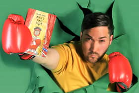 Oliver Sykes with his book Alfie’s First Fight, which he now has a touring show for children based on. Photo: Oliver Sykes