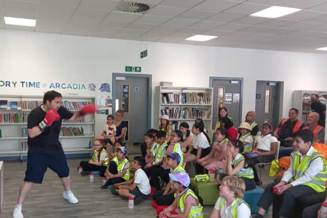 Oliver Sykes performing at Arcadia Library in Levenshulme