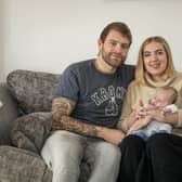 Father Ross Naylor and mother Abi Naylor with their son Roman  Credit: Matthew Lofthouse /SWNS