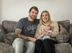 Father Ross Naylor and mother Abi Naylor with their son Roman  Credit: Matthew Lofthouse /SWNS