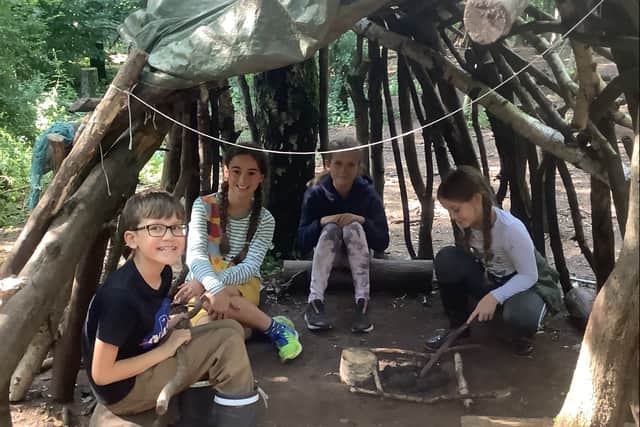 Children enjoying forest school with We Are Adventurers