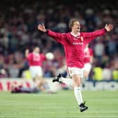 Ole Gunnar Solskjaer celebrating after Manchester United won the 1999 UEFA Champions League final against Bayern Munich. Photo:  Ben Radford/Allsport/Getty Images/Hulton Archive